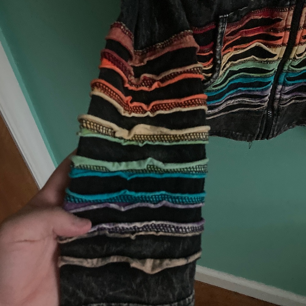 Light denim jacket with hand stitched rainbow stripes